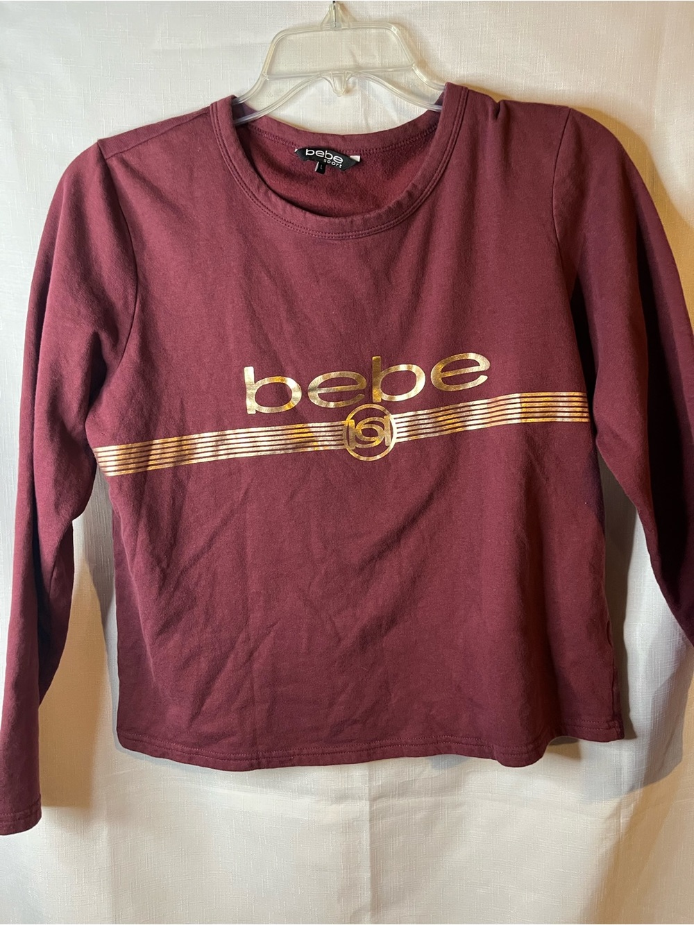 bebe Long Sleeve Tee in Burgundy with Gold Logo